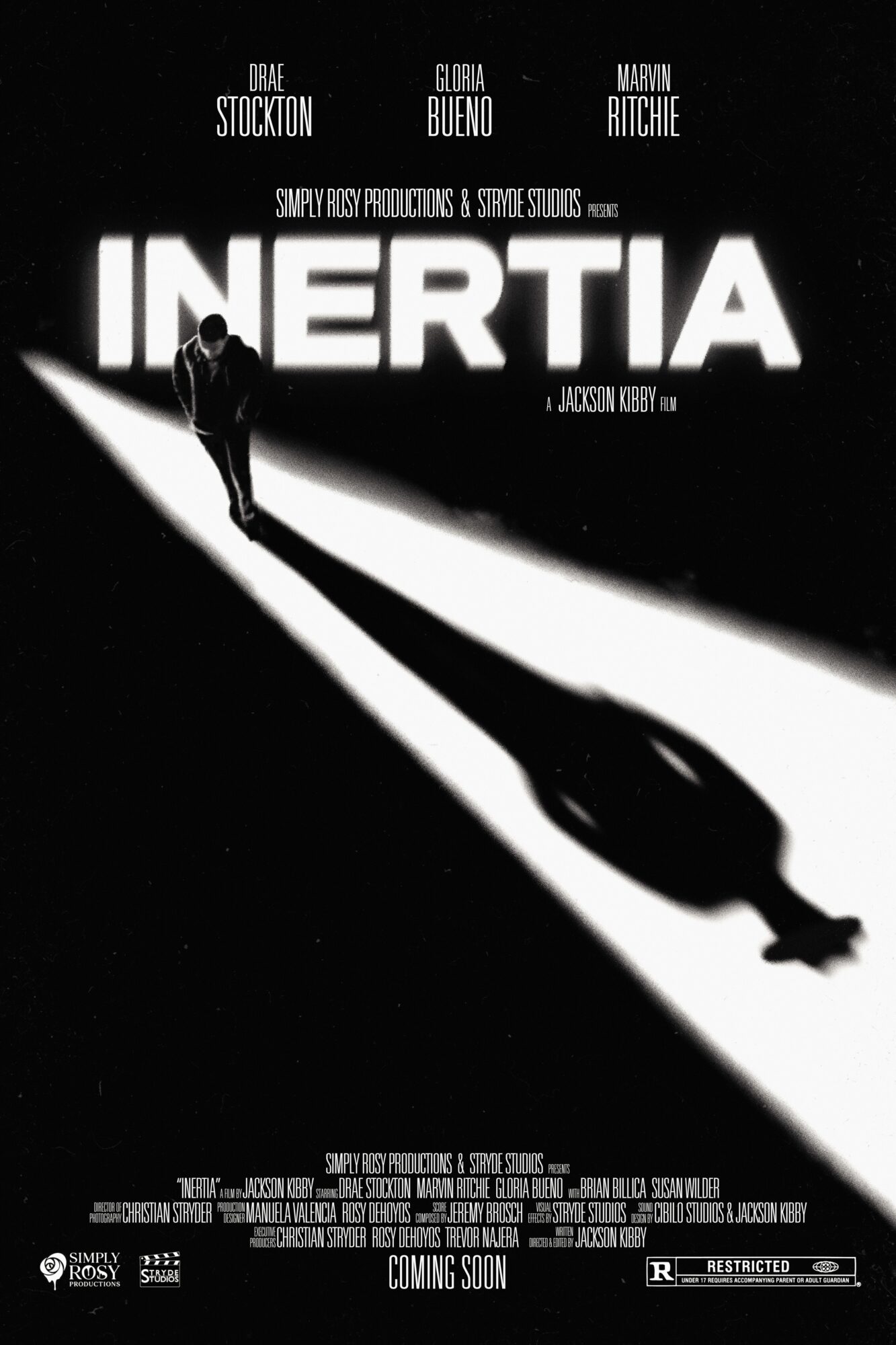 Silhouette of a person walking on a curved path with a large shadow, against a black background, with the title 'INERTIA'.