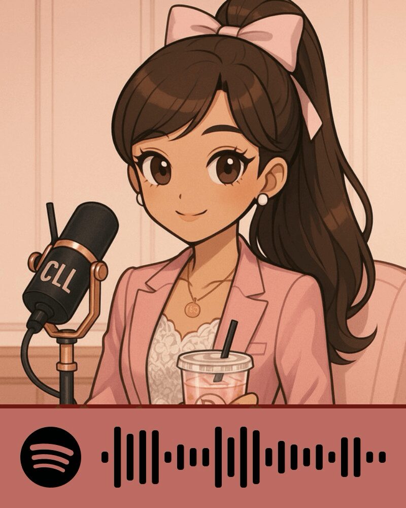 Animated girl with long dark hair, pink bow, pink blazer, holding a drink and sitting in front of a microphone.