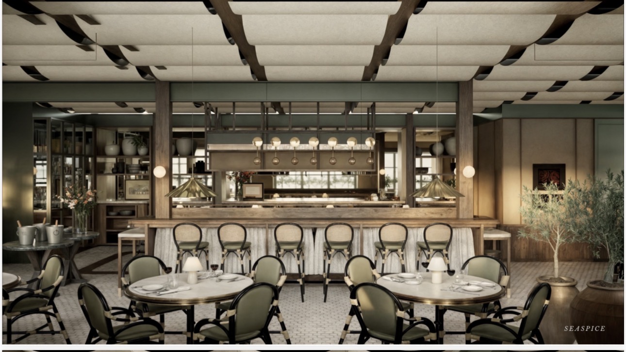 Elegant restaurant interior with round tables, chairs, a bar, and decorative plants, illuminated by warm lighting.