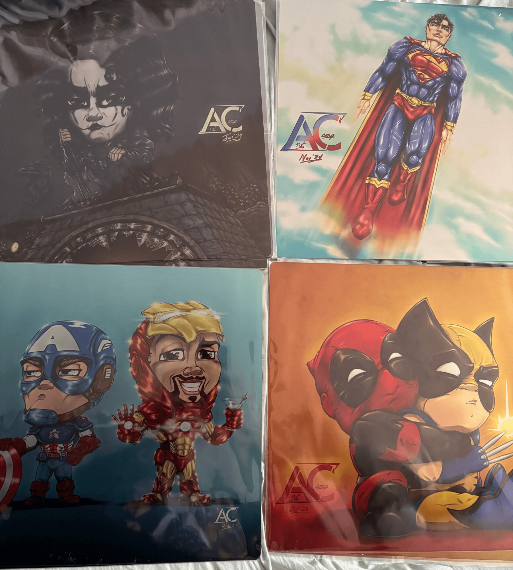 Four comic book covers featuring superhero characters, including Superman, Deadpool, and others, with colorful backgrounds.