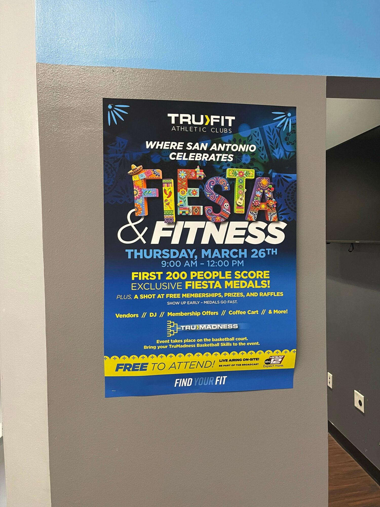 Fitness poster with blue background, colorful text, and yellow highlights, promoting health and fitness programs.