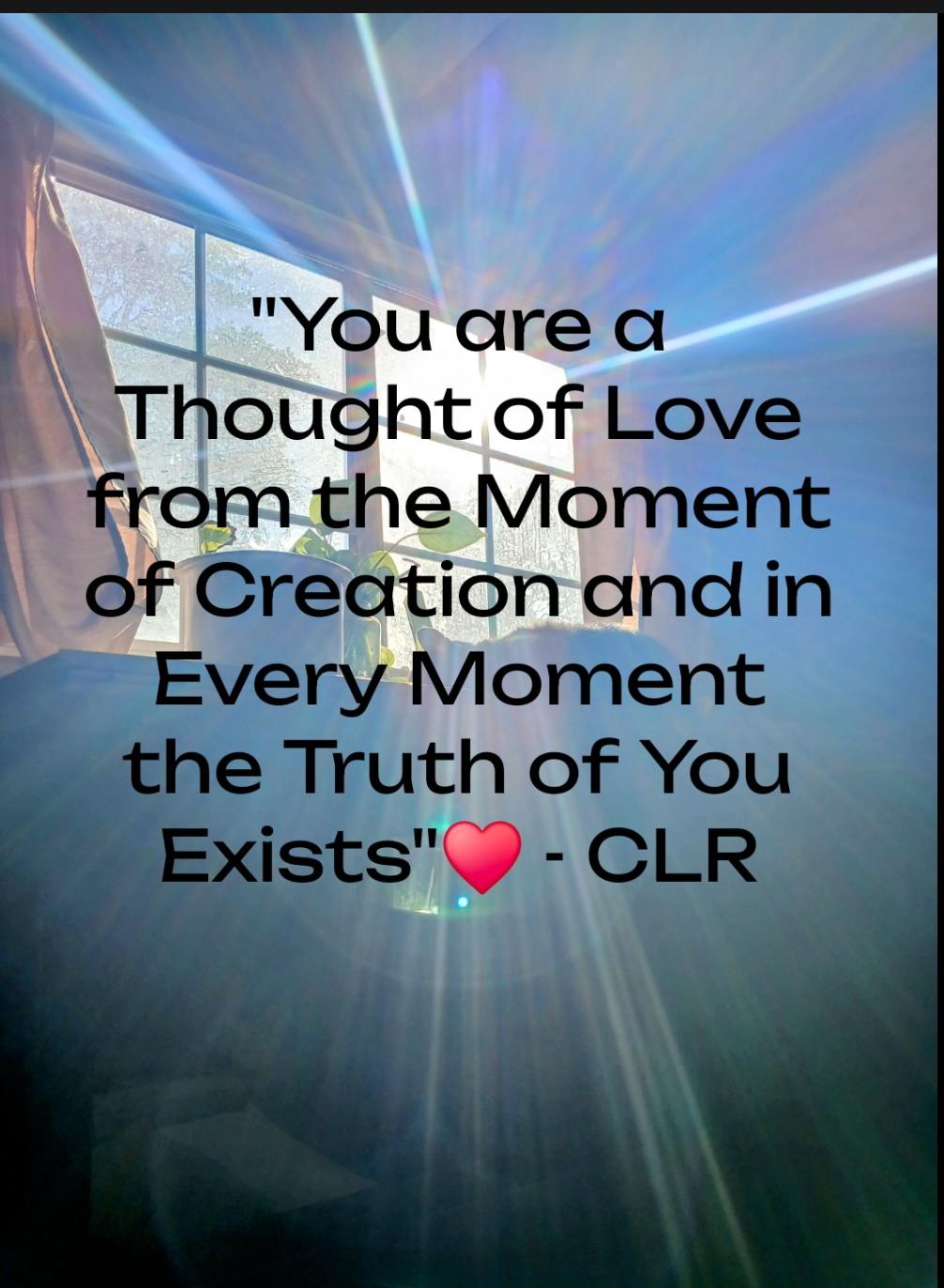 Sunlight streams through a window onto a wall with a quote about love and truth, ending with a red heart emoji.