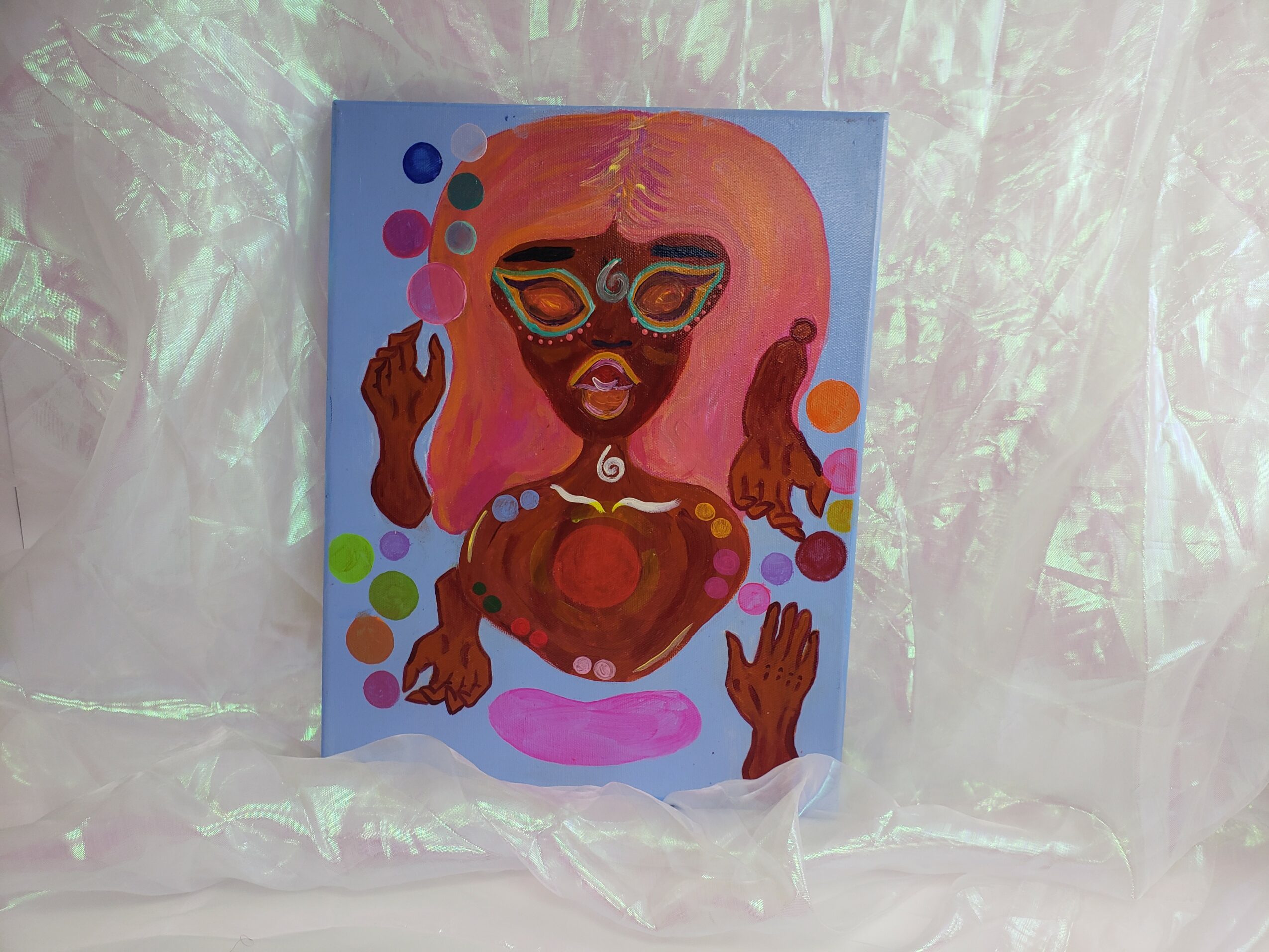 Colorful painting of a stylized figure with large hair, multiple arms, and abstract shapes, on a light background.