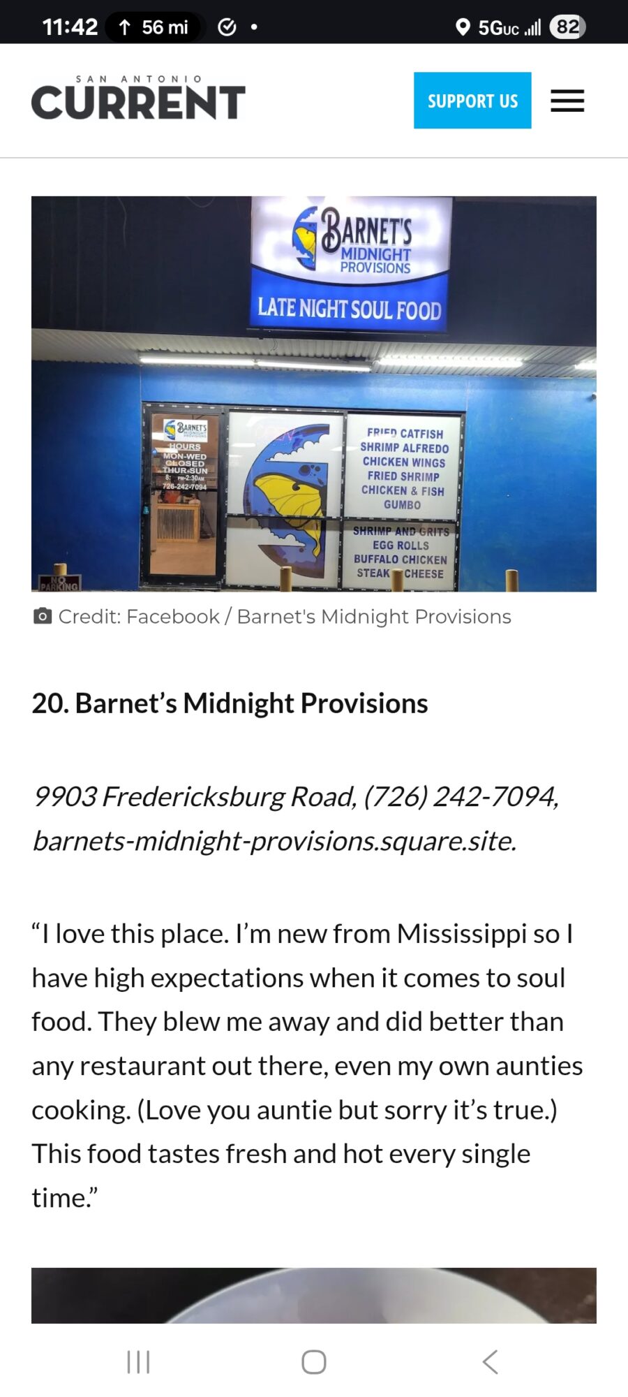 Nighttime view of Barnet's Midnight Provisions storefront with sign and window display, blue and white color scheme, and logo. Alt text word count: 20. Confidence: 0.9