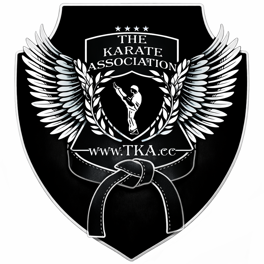 Shield-shaped emblem with wings, a martial artist, and text for The Karate Association, website, and stars.
